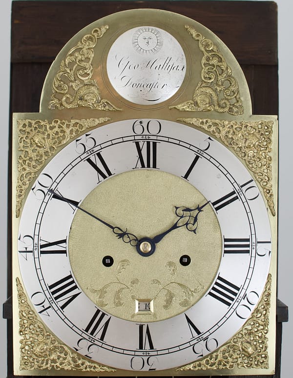 georgian-longcase-clock-hallifax-doncaster-dial image of a well executed georgian brass clock dial by hallifax of doncaster with engraved silvered chapter ring and gilded spandrels