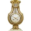 french-white-marble-lyre-mantel-clock A fine quality ormolu Mounted white Carrara marble striking lyre mantel clock, circa 1890, retailed by Howell and James, maker to the Queen, London and Paris.