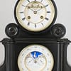 french-perpetual-calendar-mantel-clock-dial detailed image showing two white enamelled dials of a fine quality 19th century French marble perpetual calendar mantel clock with moonphase indication, by A Brocot & Delettrez Paris circa 1870.