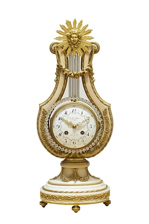 french-white-marble-lyre-mantel-clock A fine quality ormolu Mounted white Carrara marble striking lyre mantel clock, circa 1890, retailed by Howell and James, maker to the Queen, London and Paris.