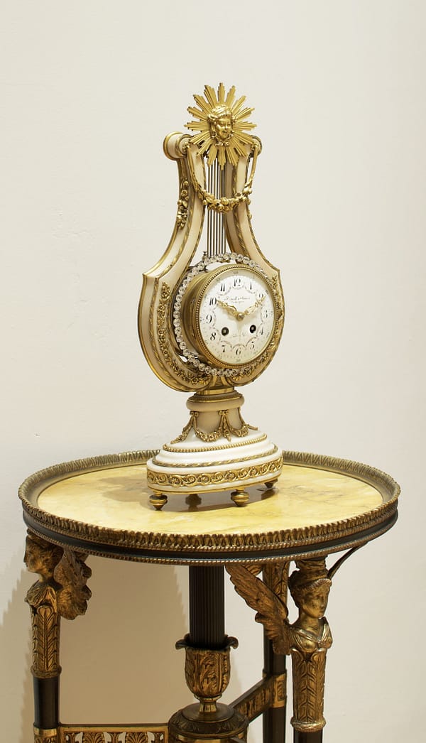 french-white-marble-lyre-mantel-clock-showroom Showroom image of the Carrara marble antique mantel clock.