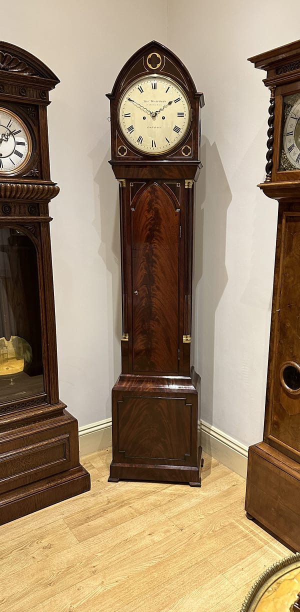 wightman-london-georgian-mahogany-longcase-grandfather-clock-showroom-view Showroom image of a flame mahogany longcase clock by Wightman of London