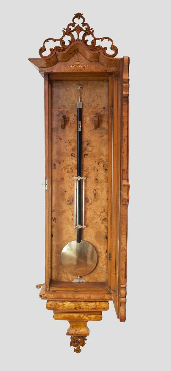 biedermeier-viennese-elm-one-month-wall-clock-side-view Image of the wooden rod brass bob pendulum