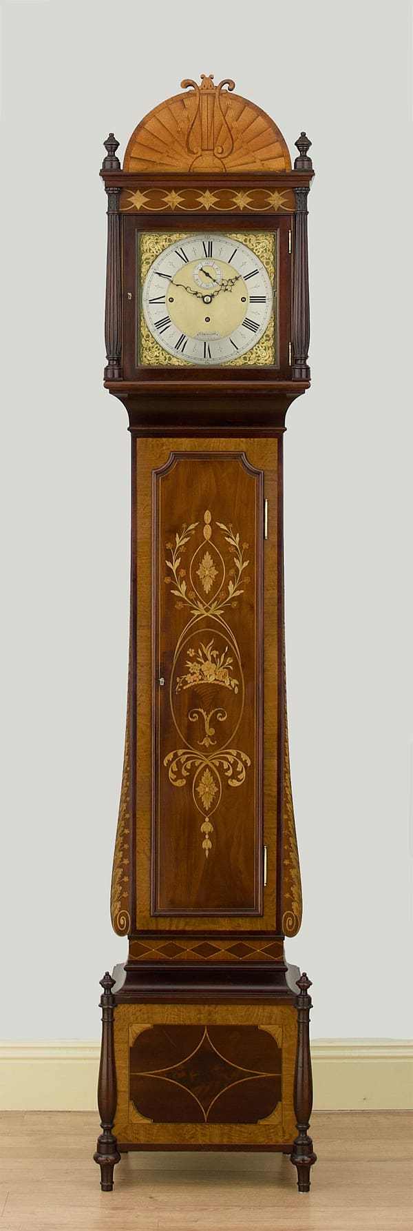 smith-london-longcase-main Impressive sheraton style mahogany cased longcase clock by Smith of London with abrass dial and fully restored quarter chiming movement.