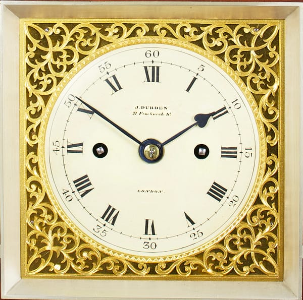 durden-london-mahogany-antique- bracket-clock-dial A square brass and enamel antique clock dial signed to the centre Durden London