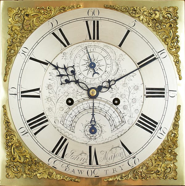 mason-bawtry-georgian-oak-brass-dial-longcase-grandfather-clock-dial Image showing the antique longcase clock brass dial with finely cast brass spandrels and blued steel hands
