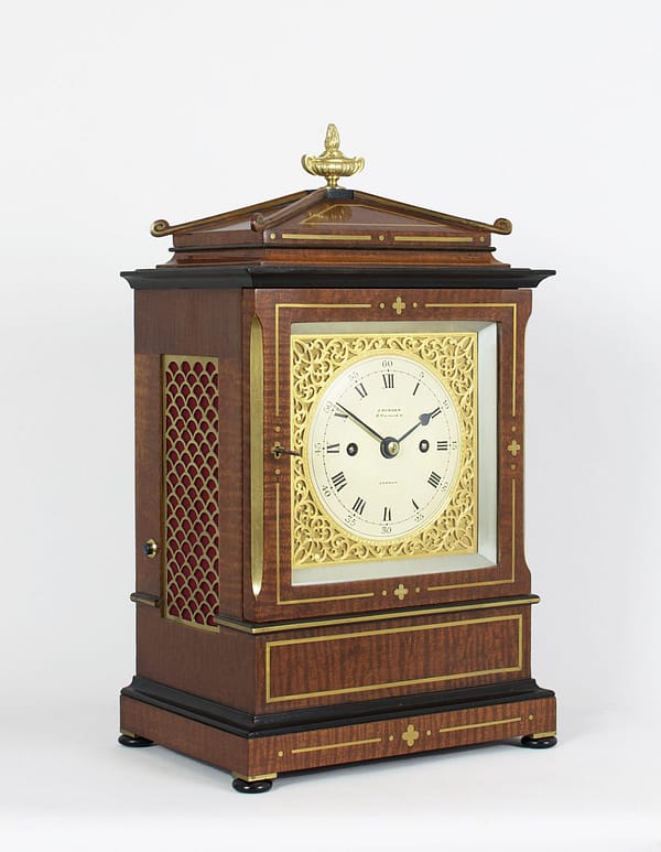 durden-london-mahogany-antique- bracket-clock-side-view A square antique clock dial with a convex circular centre signed Durden London, surrounded bya gilded brass square mask.