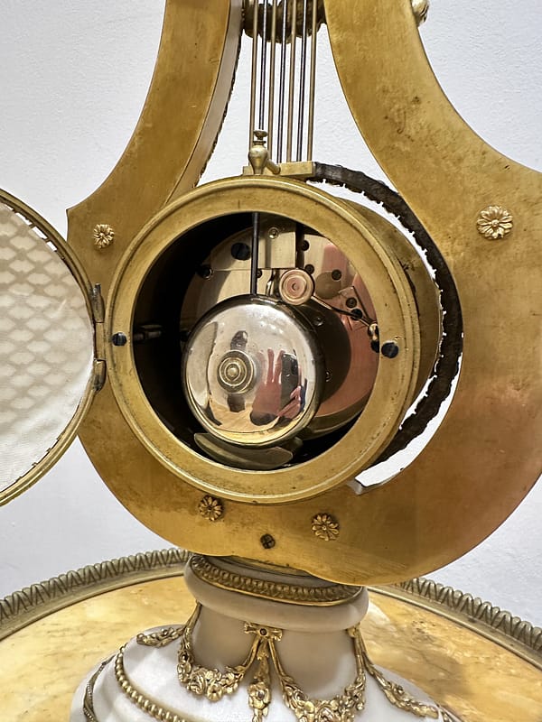 french-white-marble-lyre-mantel-clock-movement Detailed image of the antique mantel clock movement