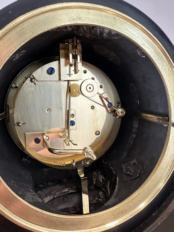 french-perpetual-calendar-mantel-clock-movement an 8 day round brass French clock movement circa 1870 by Brocot and Delettrez Paris