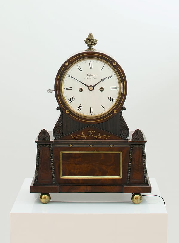 mahogany-bracket-mantel-clock-leplastrier-london Image of the Leplastrier of London bracket clock in a showroom setting