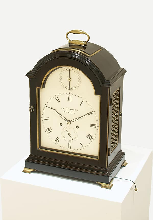 london-georgian-single-pad-top-fusee-bracket-table-clock-main-top A fine and attractive example of an ebonised bracket clock with its original matching wall bracket. Made by the eminent maker J Thwaites of London and retailed by James Lindley of London.