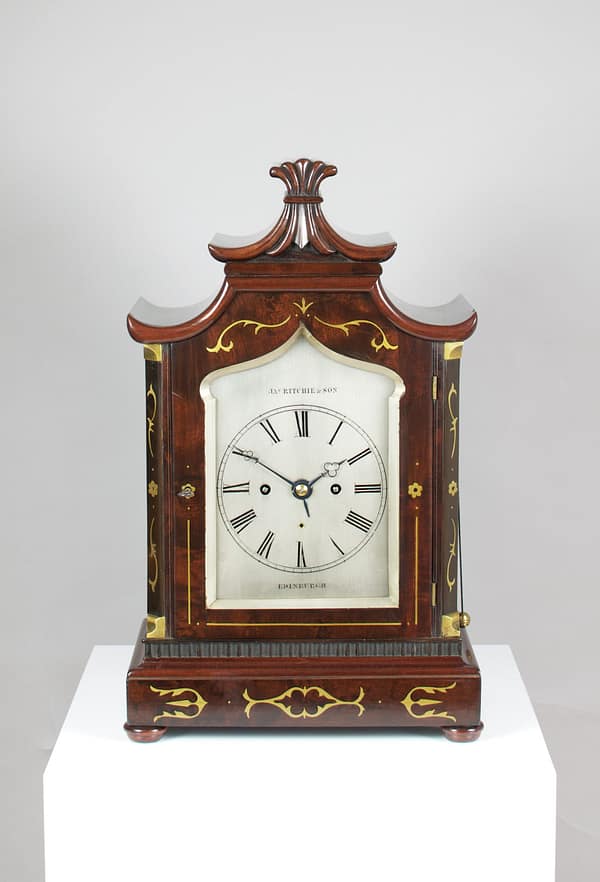 ritchie-edinburgh-mahogany-regency-fusee-bracket-clock-master Image of the Ritchie of Edinburgh clock in a showroom setting