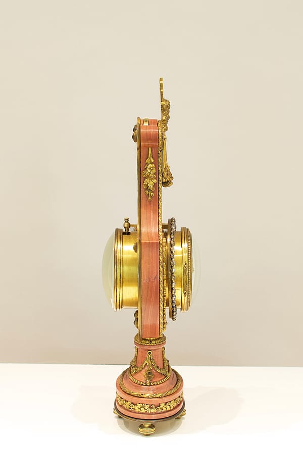 small-french-marble-lyre-mantel-clock-side-image A French Marble And Ormolu Mount Lyre Mystery Mantel Clock. side view