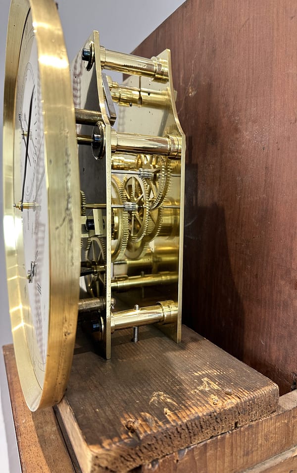 hutton-edinburgh-mahogany-regulator-longcase-clock-movement Detail of the regulator movement maintaining power.
